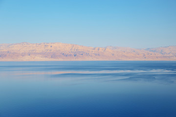 Fototapeta na wymiar Beautiful view of salty Dead Sea shore with clear water. Israel.
