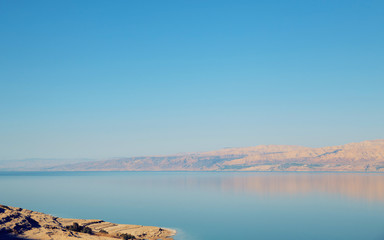 Beautiful view of salty Dead Sea shore with clear water. Israel.