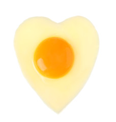 Heart shaped fried egg isolated on white, top view