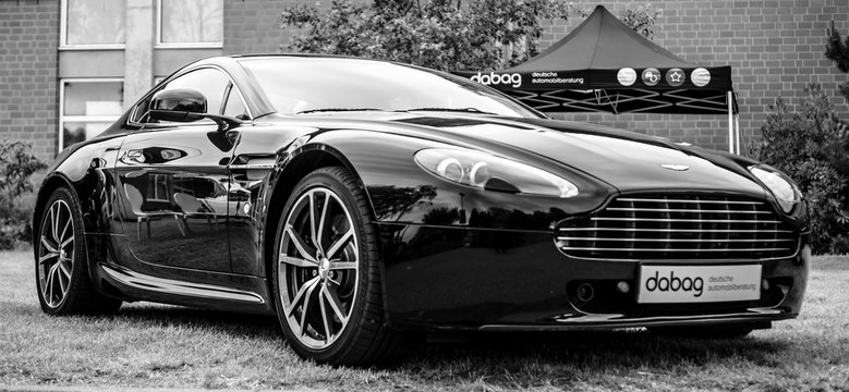 PAAREN IM GLIEN, GERMANY - JUNE 03, 2017: Sports car Aston Martin Vantage, 2010. Black and white. Exhibition "Die Oldtimer Show".
