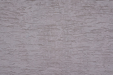 Full frame image of gray decorative surface with long horizontal scratches. High resolution texture of woodworm plaster for 3d models, background, pattern etc.