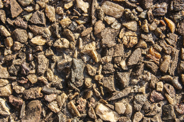 Texture old rock wall made of random stone background