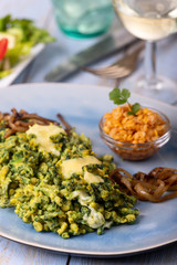 bavarian spinach spaetzle on a plate