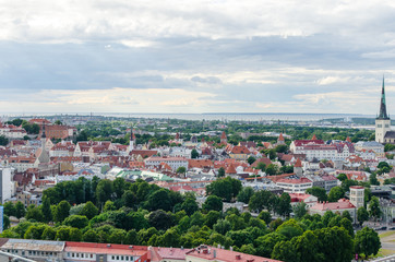 Fototapeta na wymiar Tallinn aerial view in summer, view of the sea cargo port and the Baltic Sea
