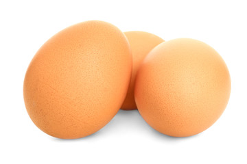 Fresh eggs on white background