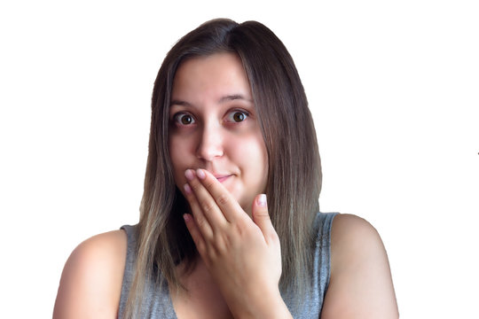 picture of amazed brunette girl with hand over mouth isolated over white background