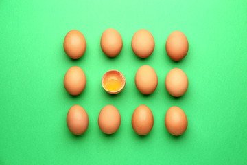 Fresh eggs on color background