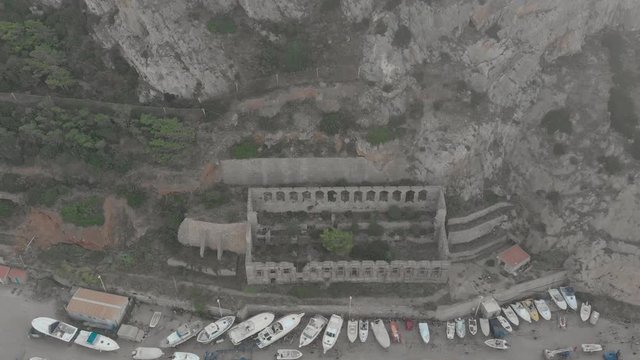 Beautiful and overgrown Church remains, Buggerru, Sardinia, Aerial view