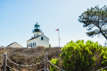 Fototapeta na wymiar Old Point Loma lighthouse, a historic lighthouse in the Cabrillo National Monument, San Diego Bay, California.