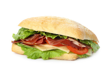 Delicious sandwich with fresh vegetables and prosciutto isolated on white