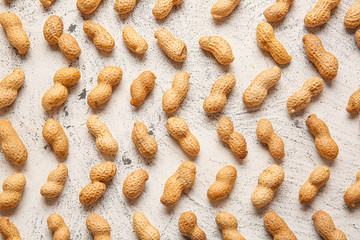 Tasty peanuts on white background