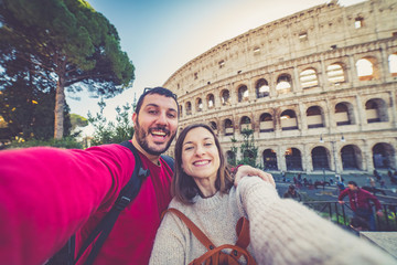 happy handsome tourist couple taking selfie in Rome, capital of Italy