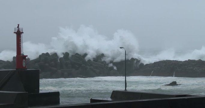Rough Sea And Waves Crash Into Port Sea Wall - Halong