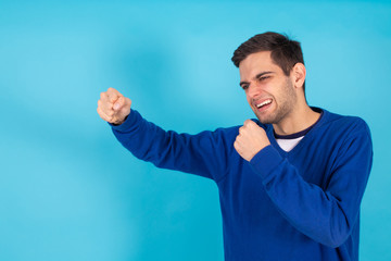 young man isolated on color background