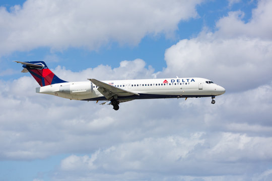 MIAMI, USA - October 16, 2016: Delta Boeing 717 commercial aircraft approaching the Miami International Airport.