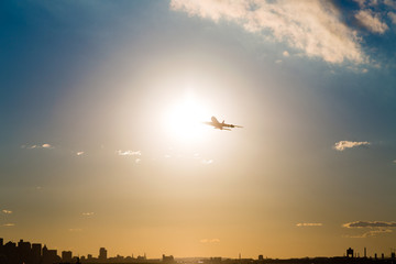 Fototapeta na wymiar Airplane taking off Logan Airport in Boston.