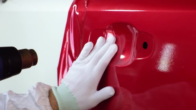 Red vinyl wrap to change the color of car