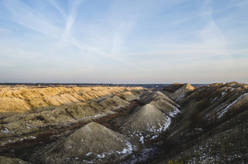 Landscape, limestone quarry with high cliffs and canyons.