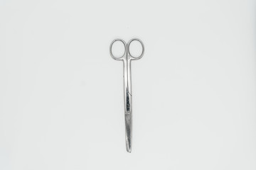 Scissors on a white background close-up