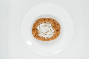 Cake on a plate on a white background close-up