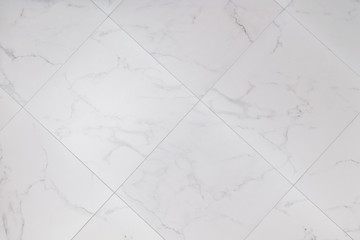 Ceramic tile with marble texture. Diagonal layout of tiles.