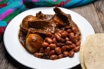 Mexican beef steak with potatoes and pasilla pepper sauce
