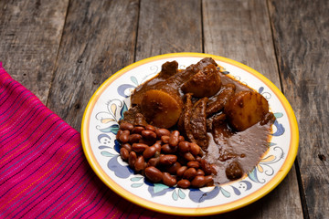 Mexican beef steak with potatoes and pasilla pepper sauce
