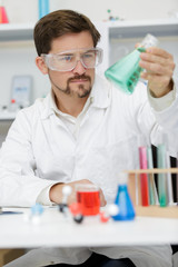 man in the lab testing new cleaning solution