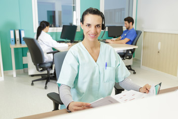 smiling receptionist at the clinic