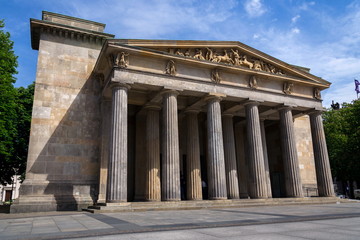 Naklejka premium Neue Wache - New Guardhouse central memorial of the Federal Republic of Germany for the Victims of War and Dictatorship from 1816, Unter den Linden boulevard, central Mitte district in Berlin, Germany