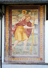 San Cristoforo; affresco esterno della chiesa parrocchiale di Daiano (Val di Fiemme, Trentino)