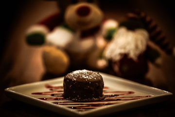 Christmas sweets in rustic cafeteria environment. Typical South American sweet known as gingerbread. Christmas decoration with chocolate candy.