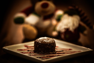 Christmas sweets in rustic cafeteria environment. Typical South American sweet known as gingerbread. Christmas decoration with chocolate candy.
