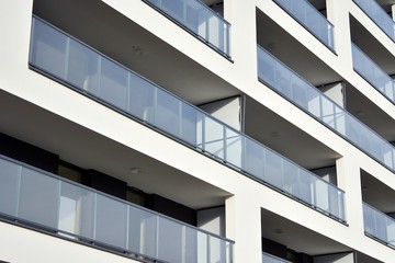 Modern and new apartment building. Multistoried modern, new and stylish living block of flats.