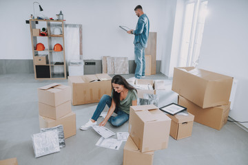 Happy young couple moving into their new home