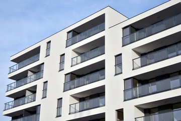 Modern and new apartment building. Multistoried modern, new and stylish living block of flats.