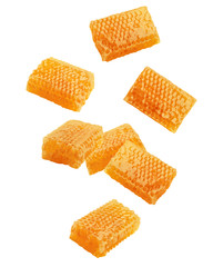 Falling Honeycomb isolated on white background, clipping path, full depth of field