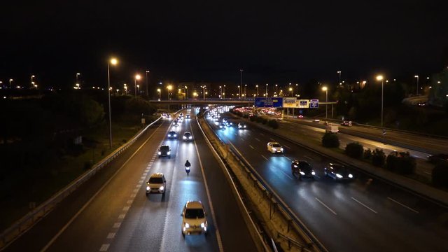 video of cars circulating at night on the road