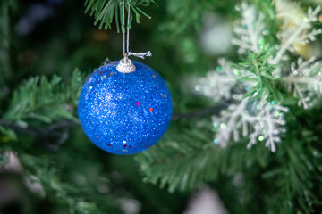 Close-up of a Christmas tree decorated.