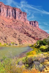 Fototapeta na wymiar Moab Panorama views of Colorado River Highway UT 128 in Utah around Hal and Jackass canyon and Red Cliffs Lodge on a Sunny morning in fall. Scenic nature near Canyonlands and Arches National Park, 