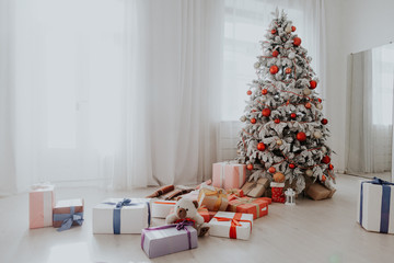 Christmas home tree with garlands of lights new year white winter