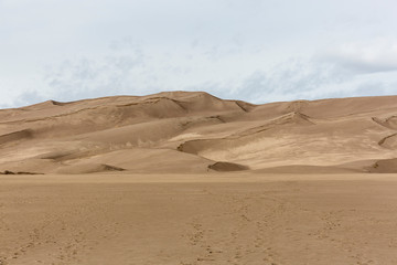 Fototapeta na wymiar Landscape view of dunes at Great Sand Dunes National Park in Colorado, the tallest sand dunes in North America.