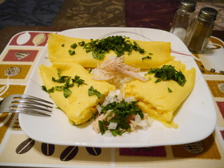 chicken veggie omelet served on a plate