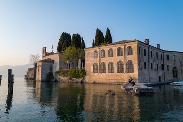 Fototapeta na wymiar Mediterranean building on lake