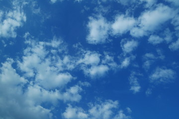 Fototapeta na wymiar A beautiful group of clouds in the blue sky background.