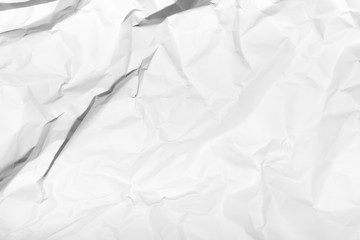 White crumpled paper texture background.