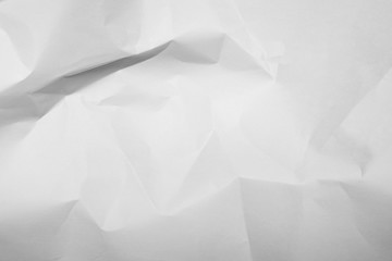Obraz premium White crumpled paper texture background.