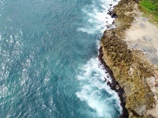 waves crashing on rocks