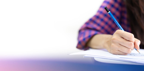 high school,university student study.hands holding pencil writing paper answer sheet.sitting...