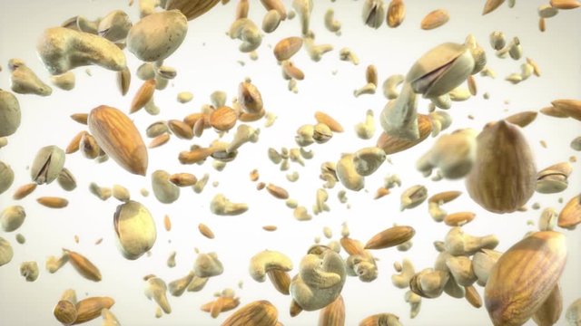 Mixed Nuts Exploding in Air. Slow Motion Animation of Almonds, Cashews and Pistachios Bursting and Flying Towards the Camera on White Background. Healthy Diet Superfood.